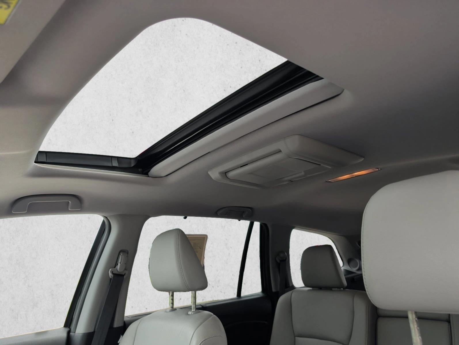 2016 Honda Pilot AWD Touring with DVD Rear Entertainment System and Navigation