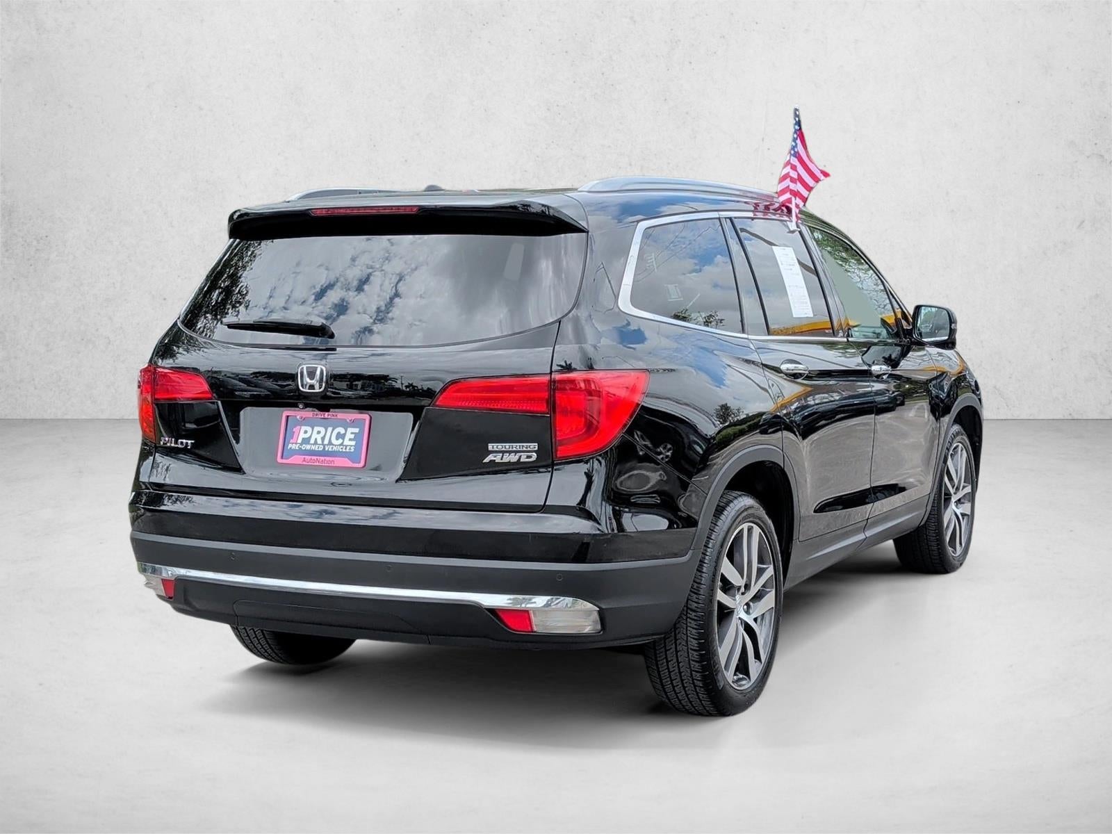 2016 Honda Pilot AWD Touring with DVD Rear Entertainment System and Navigation